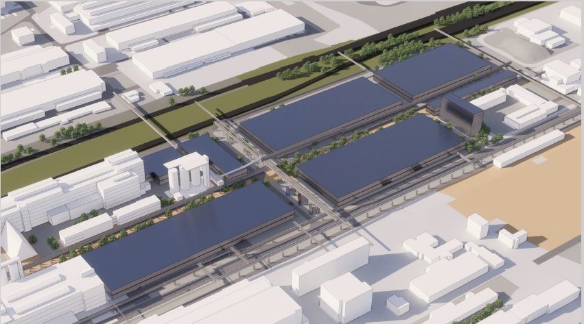 3D vizualizácia priemyselného areálu s modernými halami s modrými strechami, prepojovacími lávkami a okolitou zástavbou.